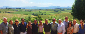 Touring Wineries with Marco: the photo shows Marco with a group of people